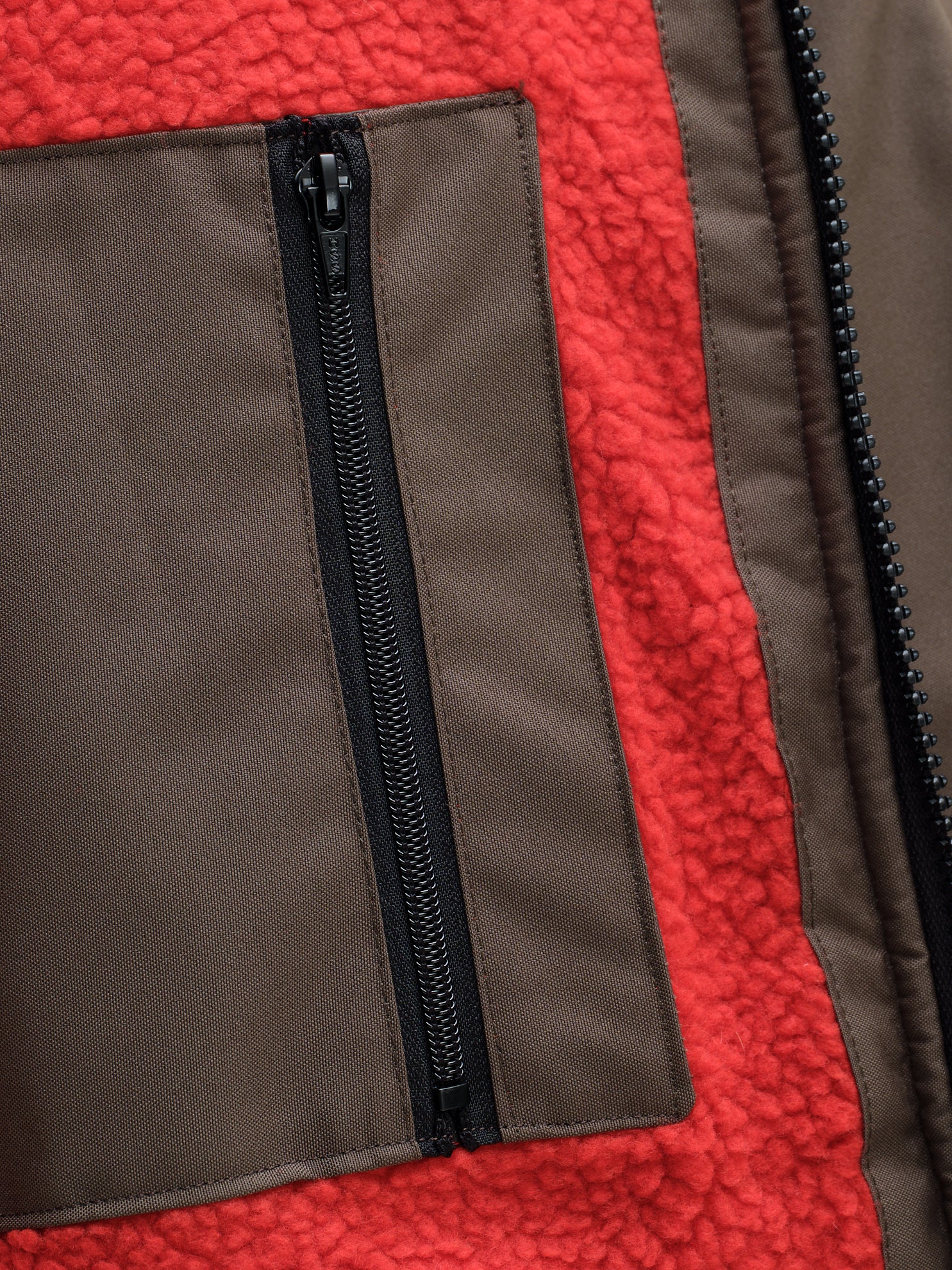 Redback robe internal pocket feature with zip for added safety.